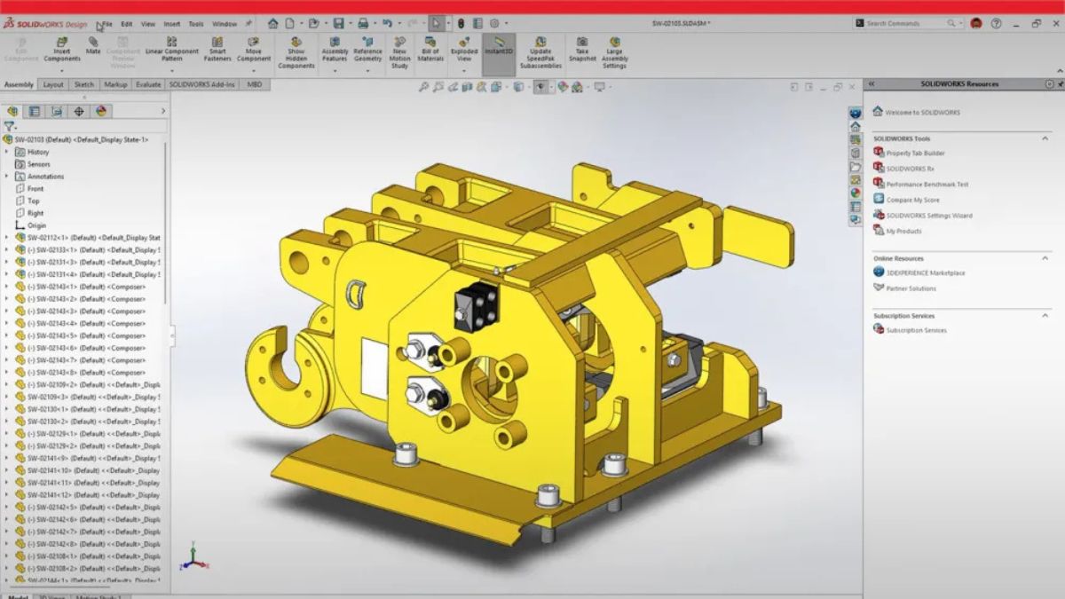 SOLIDWORKS 2026 yellow machine assembly with MBD annotations and PMI displayed in 3D