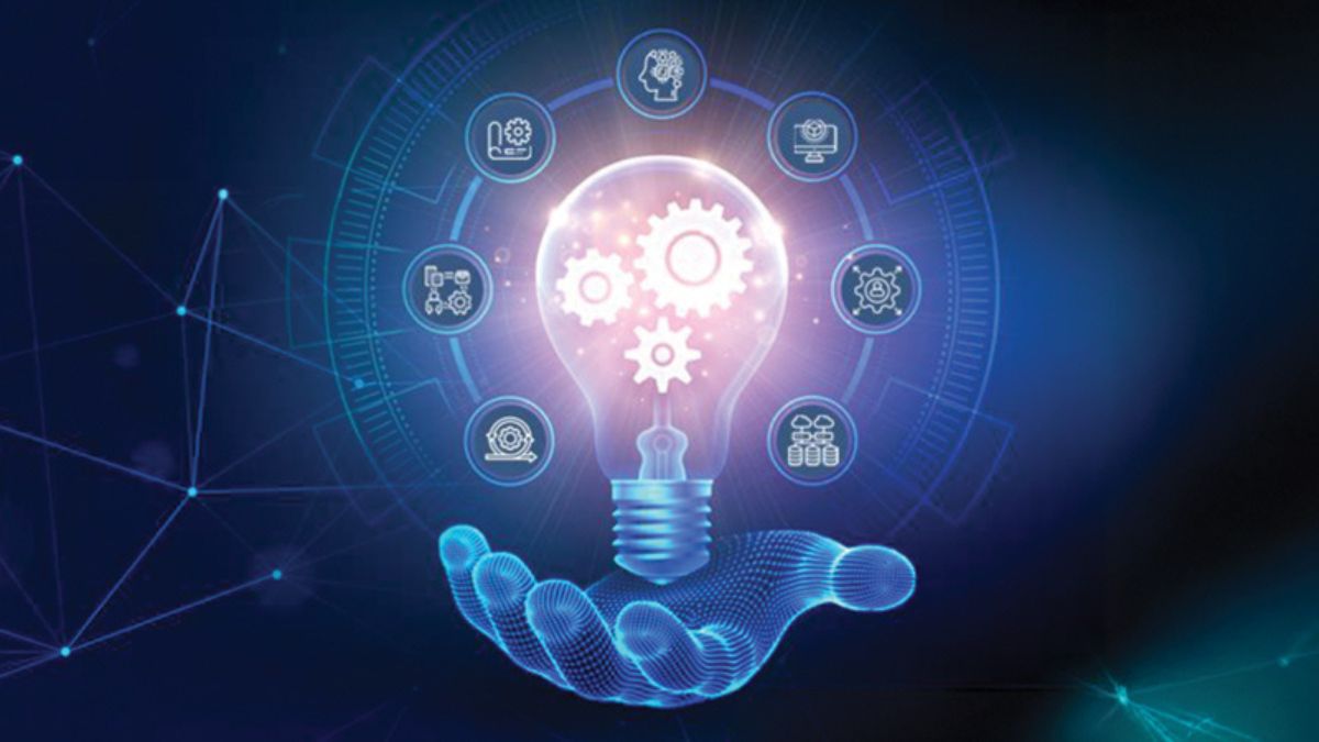 Hand holding a glowing lightbulb surrounded by gear and technology icons