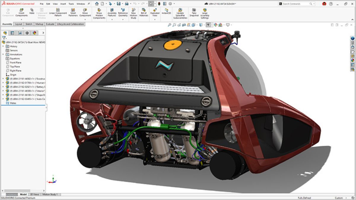 SOLIDWORKS 2026 large assembly model of a red electric concept car with transparent body panels