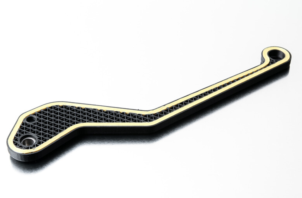 A Markforged printed brake lever reinforced with Kevlar continuous fiber reinforcement 