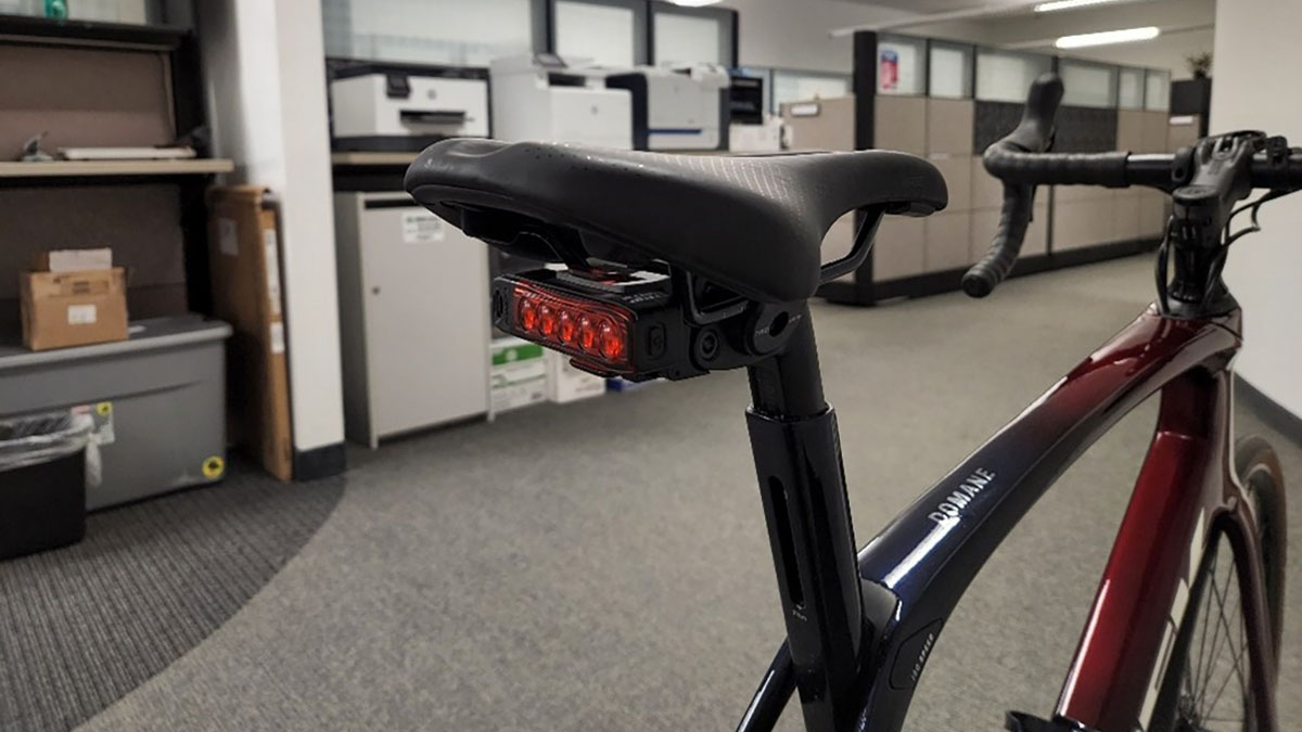 A 3D printed light adapter made with SOLIDWORKS attached to a Trek bike