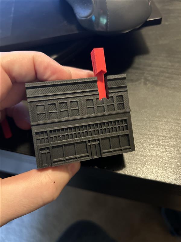 3D-printed mini building for a charity event of a library opening.