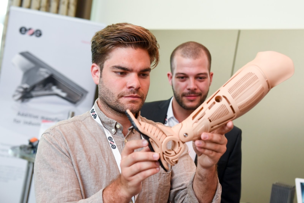 Customer holding printed prosthesis skin