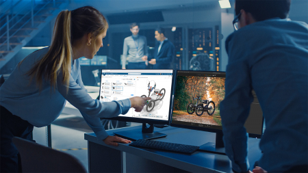 Female and Male Engineers are Discussing the 3D CAD Software Ren Female and Male Engineers are Discussing the 3D CAD Software Render of an Electric Concet Car. High Tech Laboratory with a Prototype Vehicle Chassis.