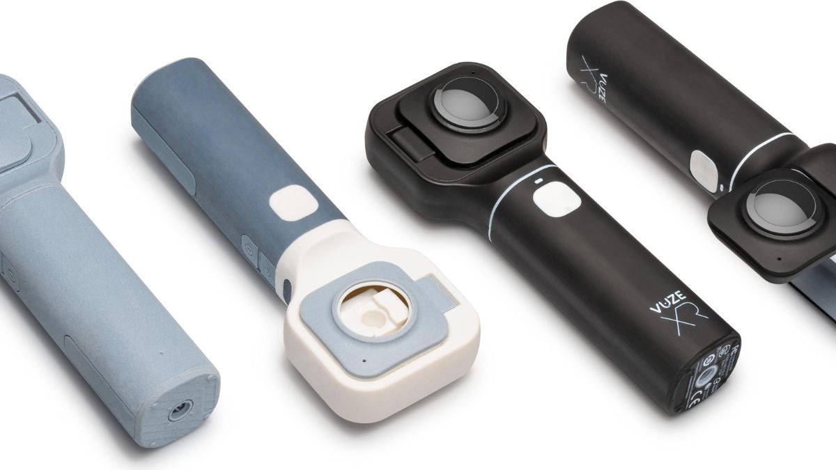 Handheld device prototypes in multiple stages of design and finished production.