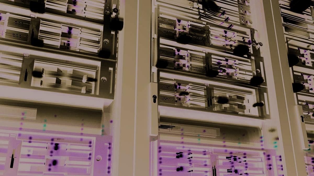 Rows of illuminated server racks in a modern data center