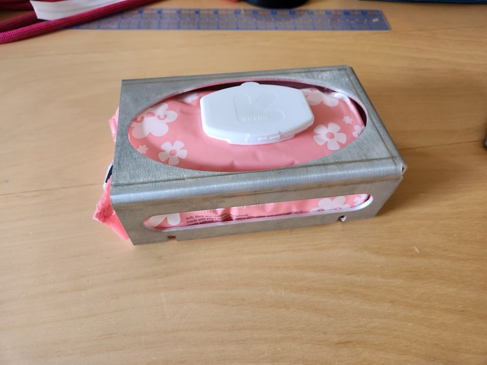 A window-mounted wet wipes box made in SOLIDWORKS