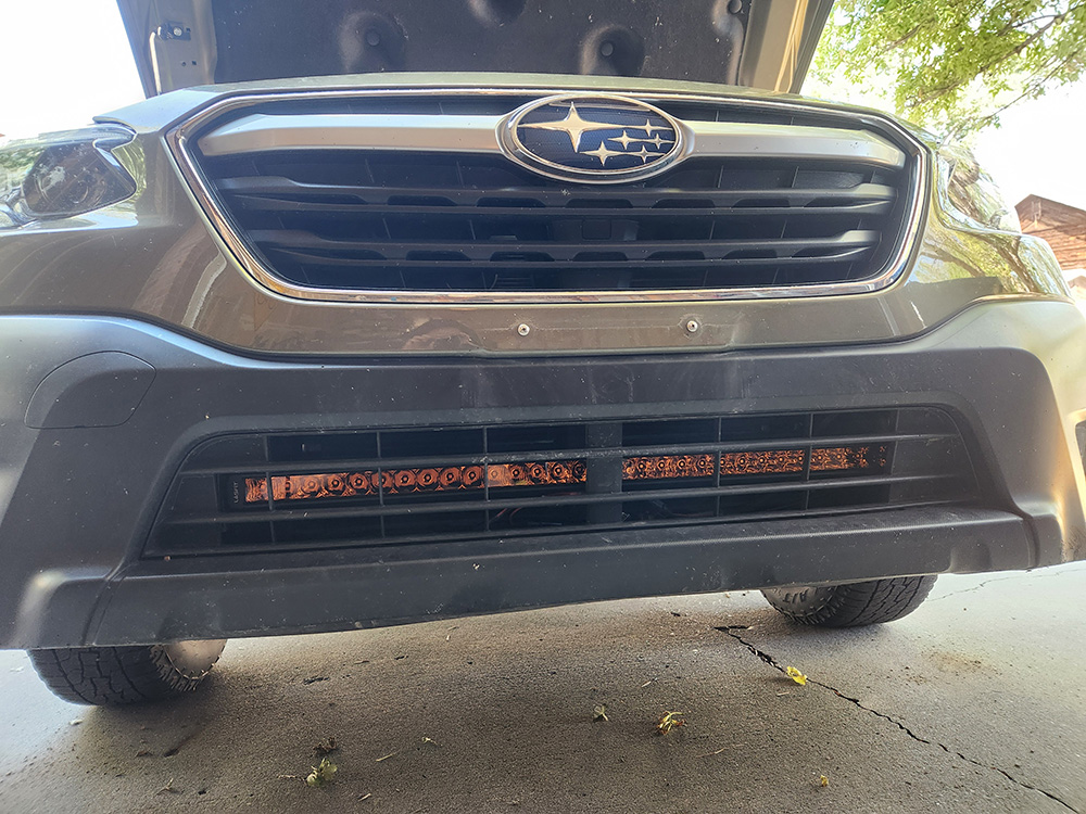 The front bumper of the Subaru Outback with the hidden light bar