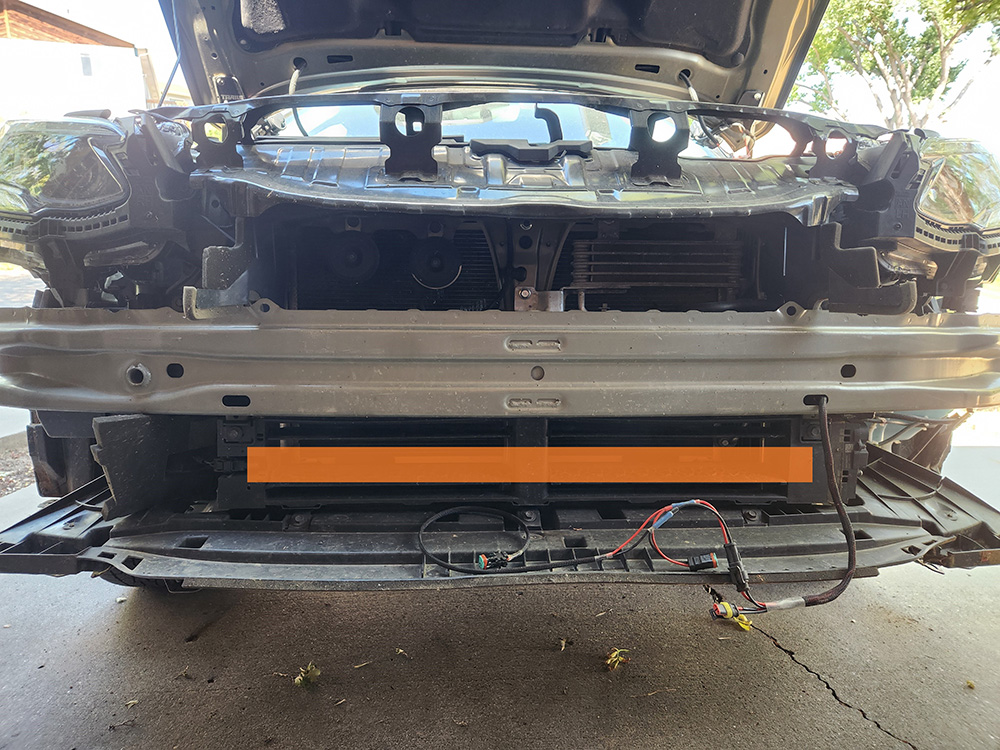 The front bumper of a Subaru Outback with the bottom section highlighted